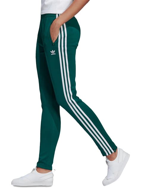 green adidas track pants women.